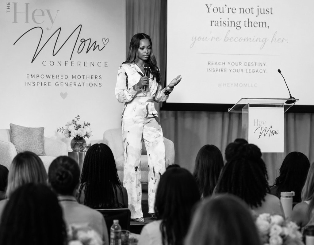 Camille speaking at a conference
